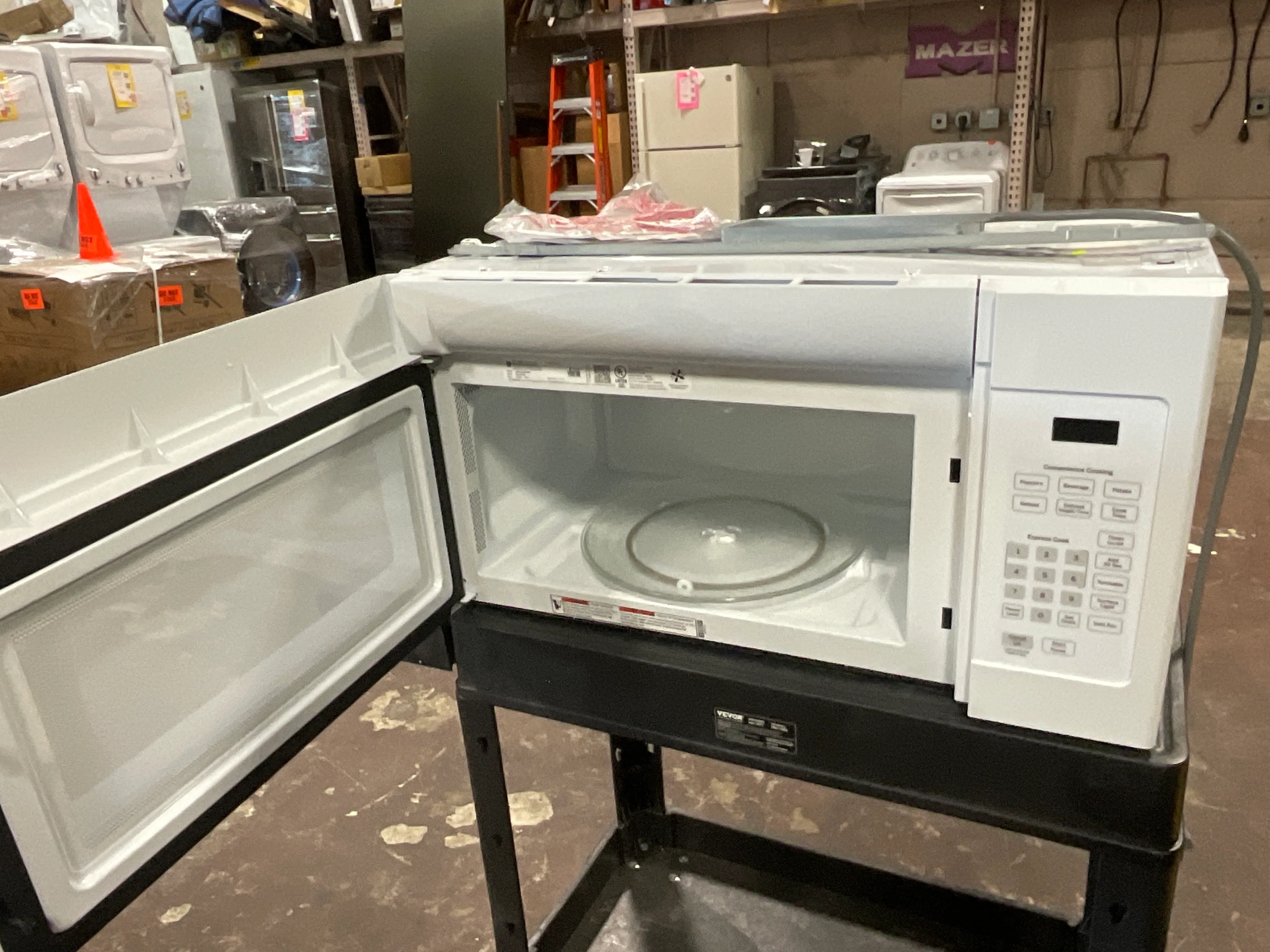 GE® 1.6 Cu. Ft. Over-the-Range Microwave Oven - Image 6